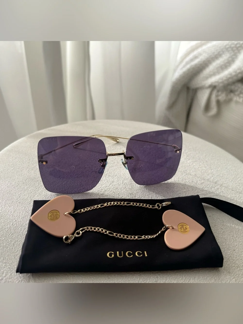 Gucci Women's Purple Rimless Sunglasses with Pink Heart Chain Accent